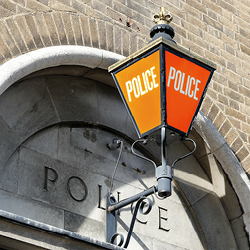 A close-up of a passport with two printed flight tickets inside